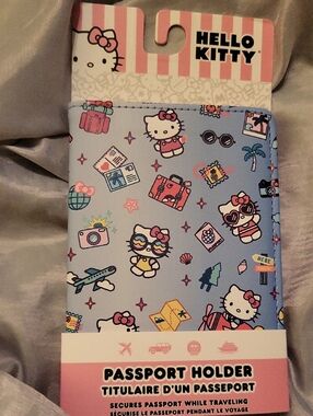 Hello Kitty Passport Holder - Light Blue with Pink and Yellow Accents LI